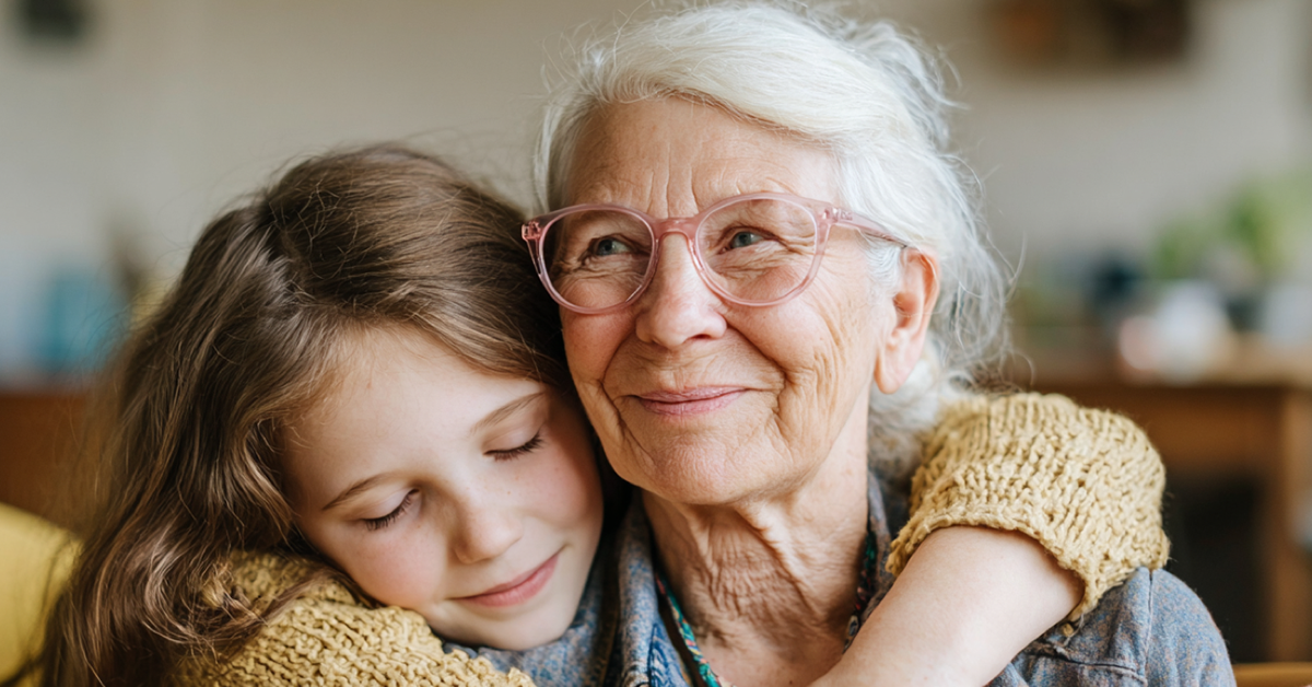 granddaughter hugging her smiling grandmother