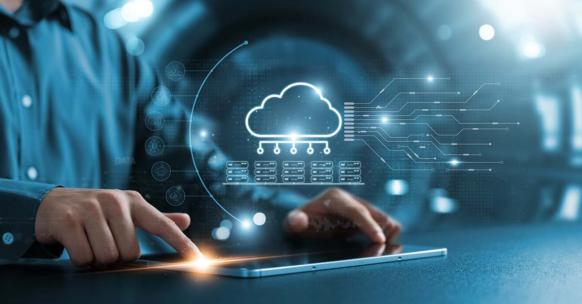 cloud overlay of a man working on a keyboard