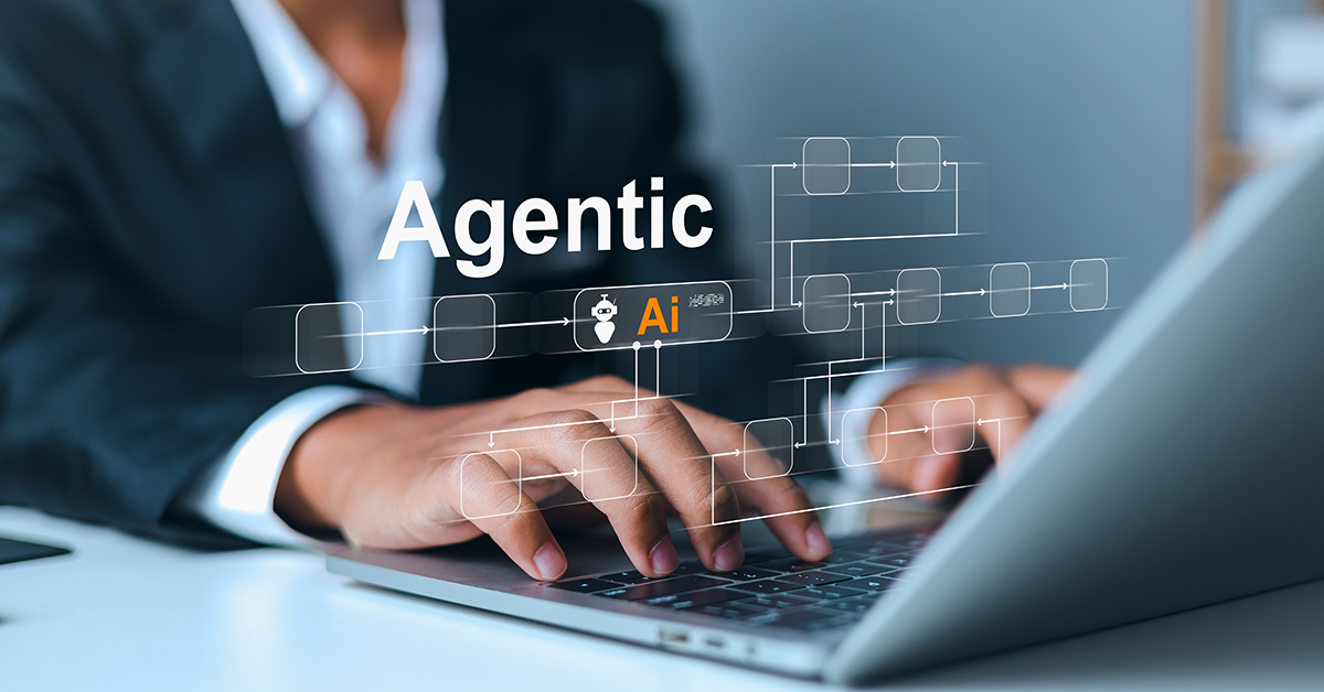 agentic ai overlay of someone working on a laptop
