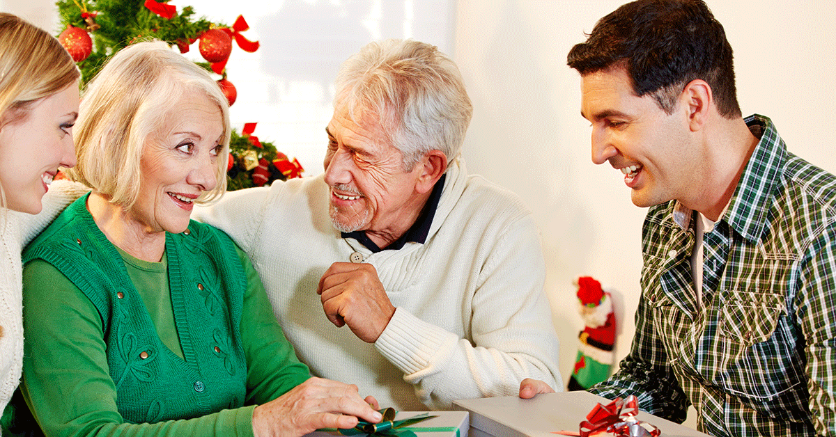 family opening Christmas presents