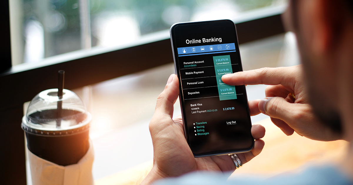 man using his phone for online banking