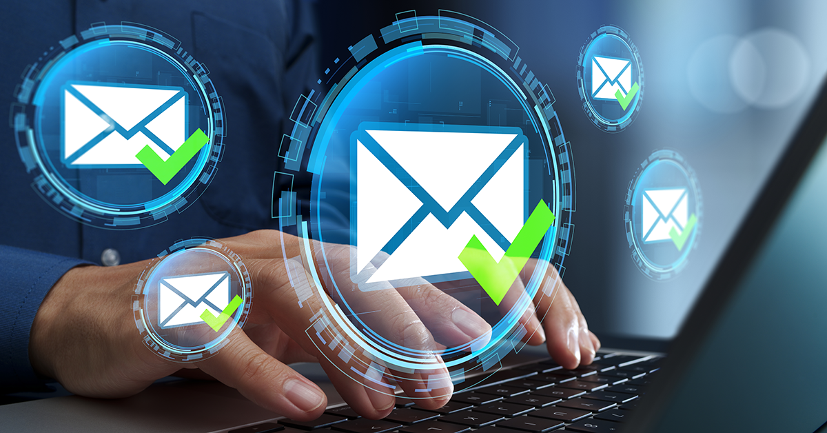 email overlay of someone working on a laptop