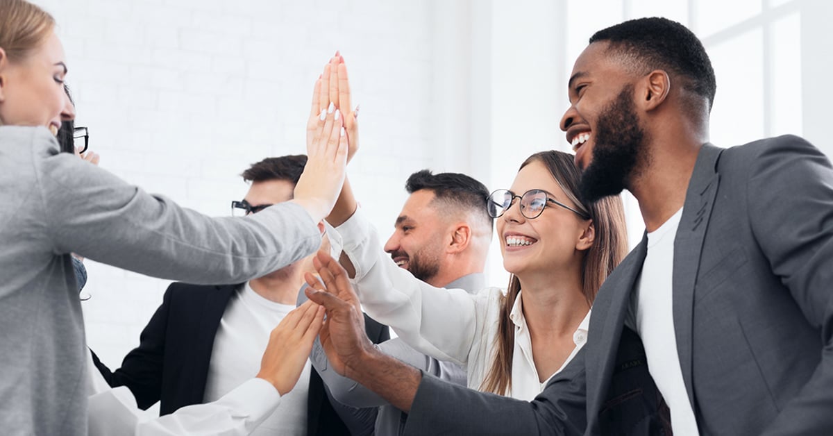 a time of executives high-fiving