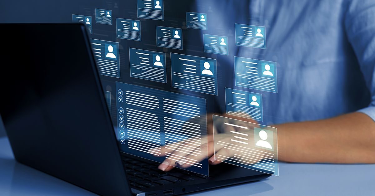contact graphical overlay of someone working on a laptop
