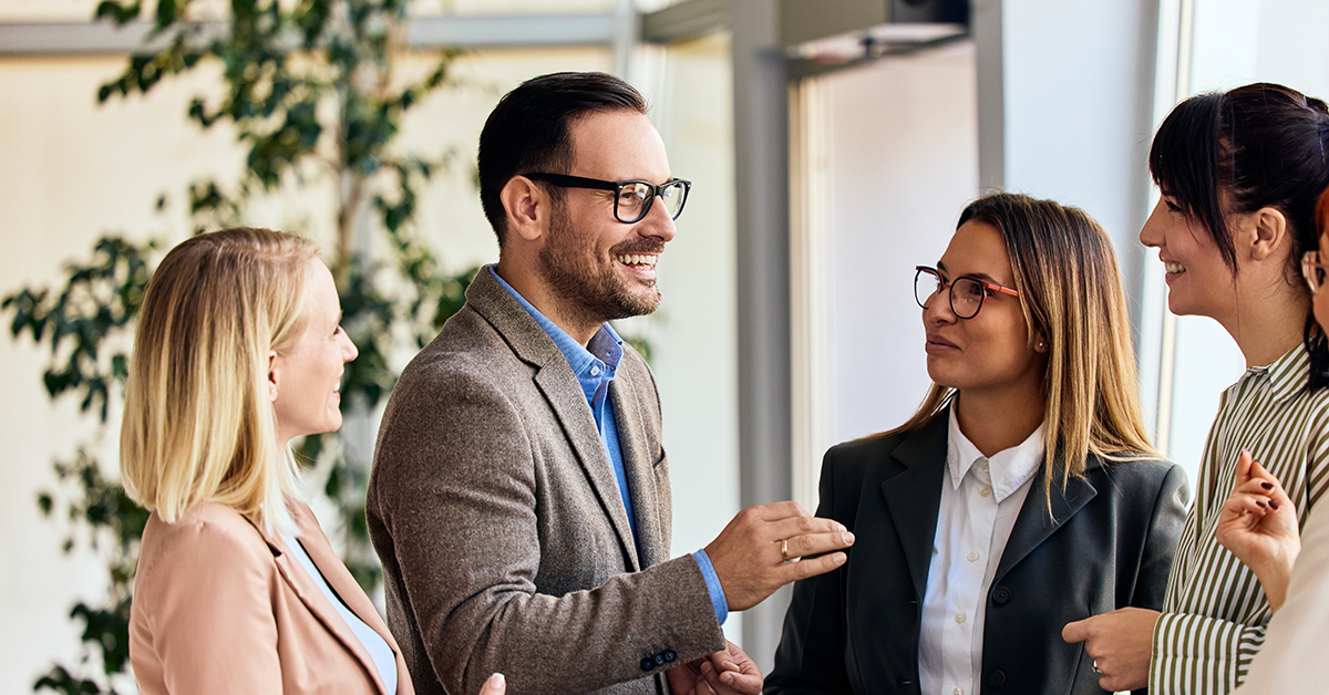 executive team talking in the office