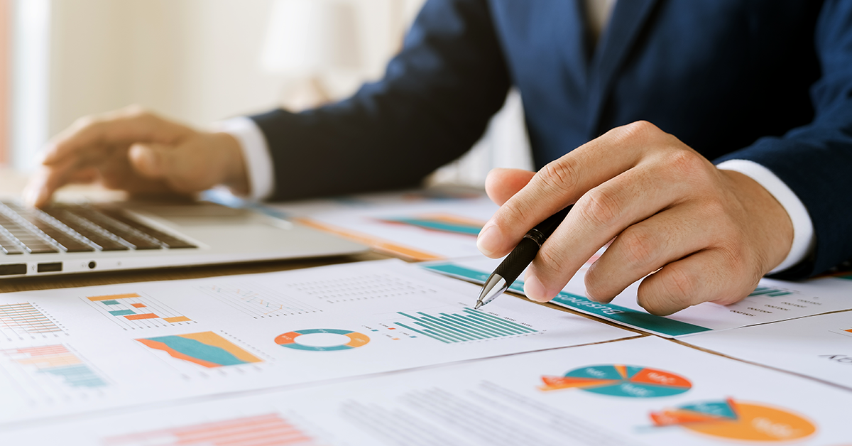 financial statement review at an office desk