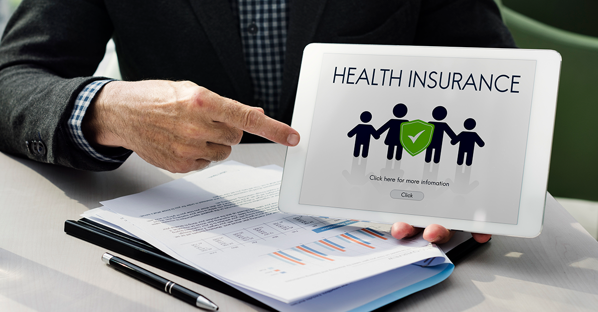 reviewing health insurance plans on a tablet