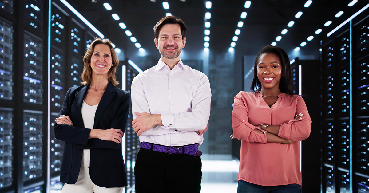 IT team in front of a server room