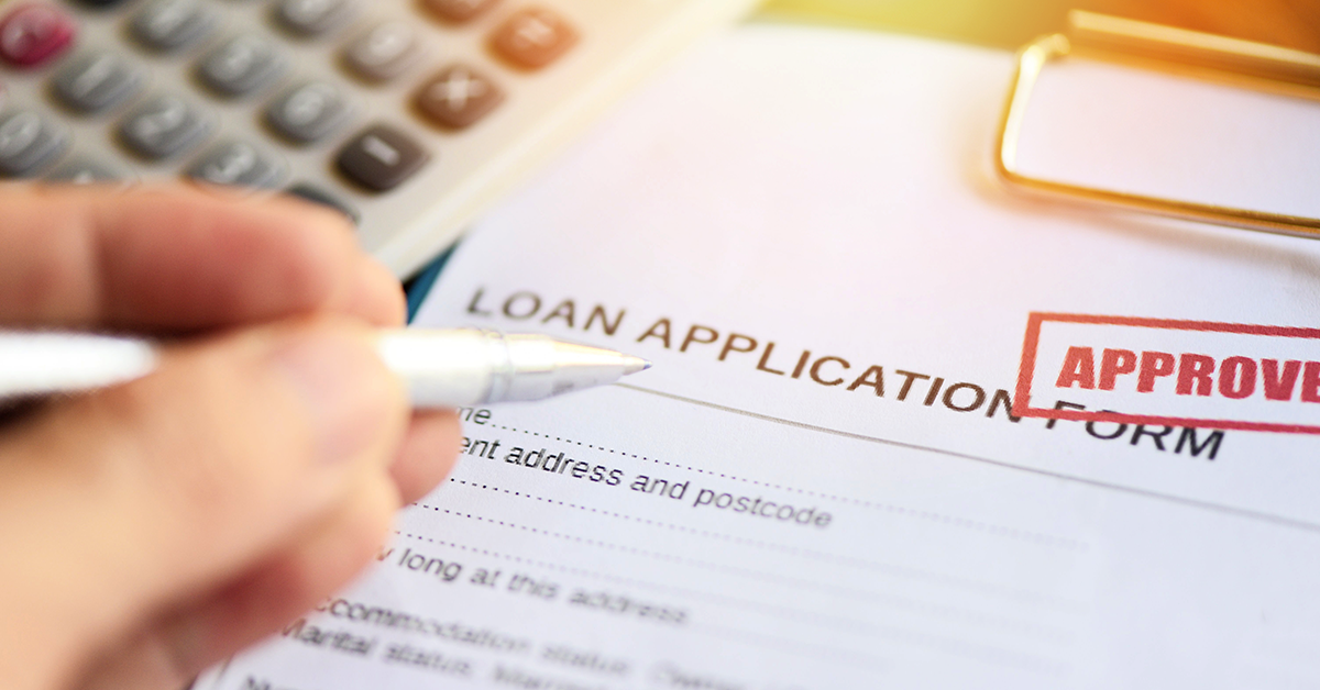 someone filling out a loan application