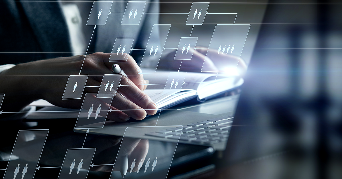 organizational chart overlayed on an image of someone doing research
