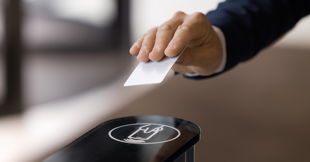 someone scanning their badge for building access