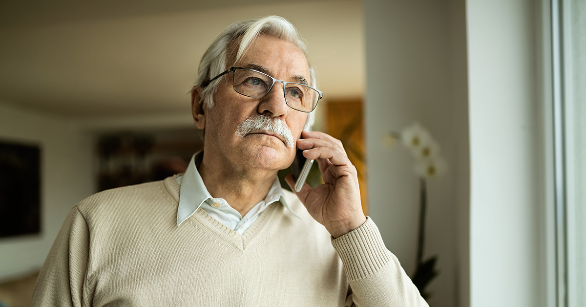 senior gentleman talking on the phone
