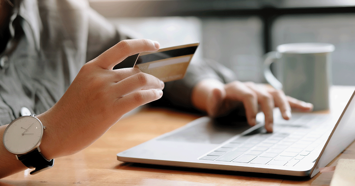someone shopping online using a laptop