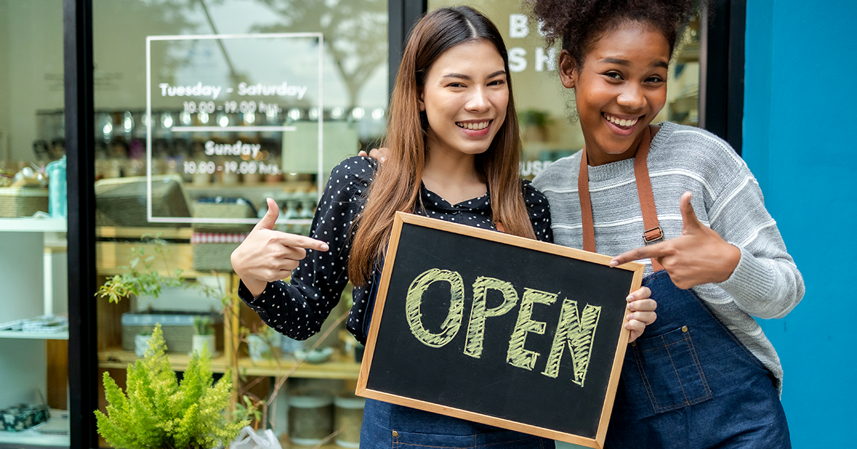 two young women opening a small business