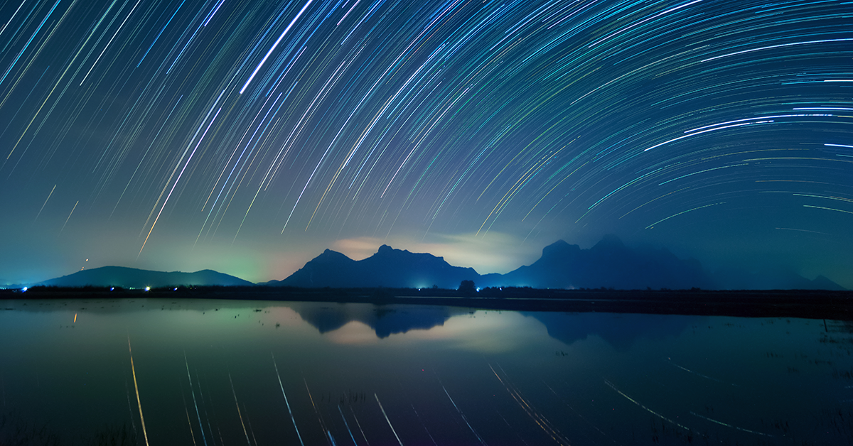 a nighttime sky with star trails