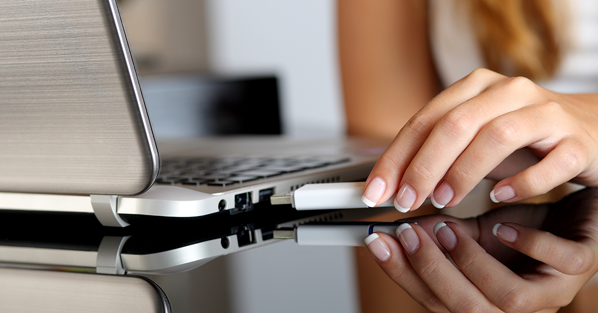 usb being inserted to a laptop