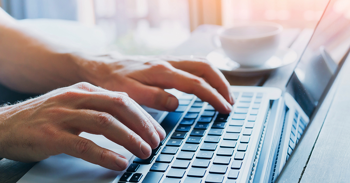 hands on a keyboard typing